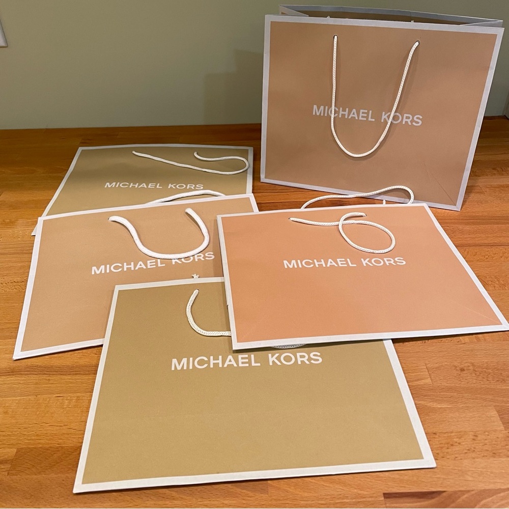 Michael Kors Tan and Cream Shopping Bags